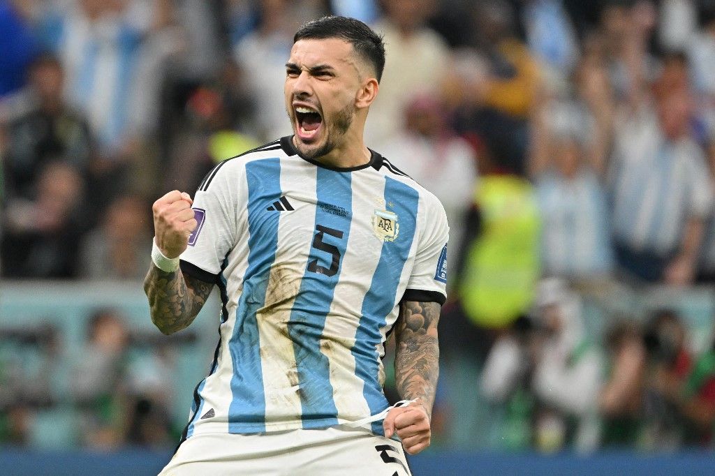 Argentina's midfielder #05 Leandro Paredes celebrates scoring during the shoot-out after extra-time of the Qatar 2022 World Cup quarter-final football match between Netherlands and Argentina at Lusail Stadium, north of Doha, on December 9, 2022. (Photo by Alberto PIZZOLI / AFP)