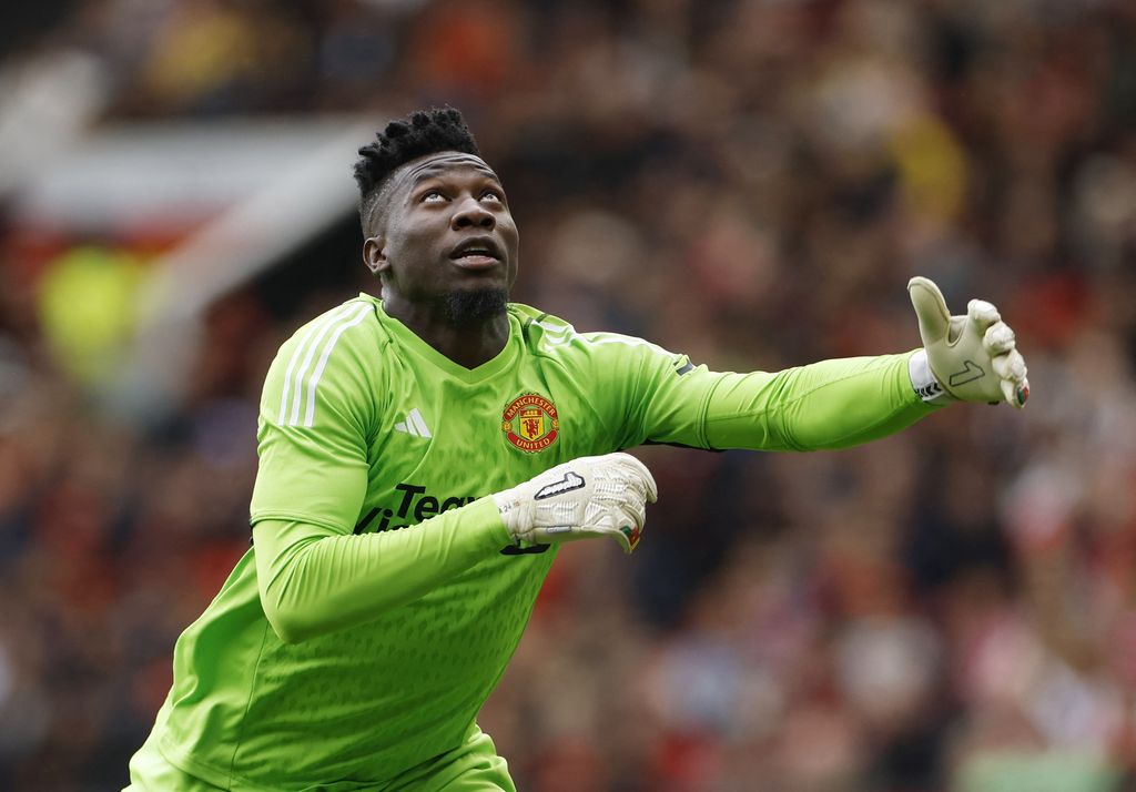 Soccer Football - Pre Season Friendly - Manchester United v RC Lens - Old Trafford, Manchester, Britain - August 5, 2023  Manchester United's Antony celebrates scoring their second goal with teammates Action Images via Reuters/Jason Cairnduff